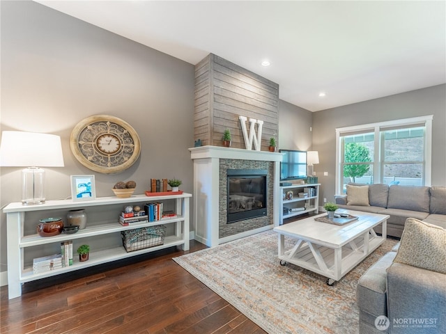 2038 Maiden Ln, Wenatchee, WA 98801 - living area with wood finished floors, a glass covered fireplace, and recessed lighting