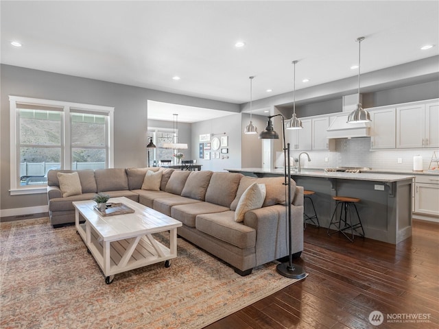 2038 Maiden Ln, Wenatchee, WA 98801 - living area with dark wood-type flooring, recessed lighting, and healthy amount of natural light