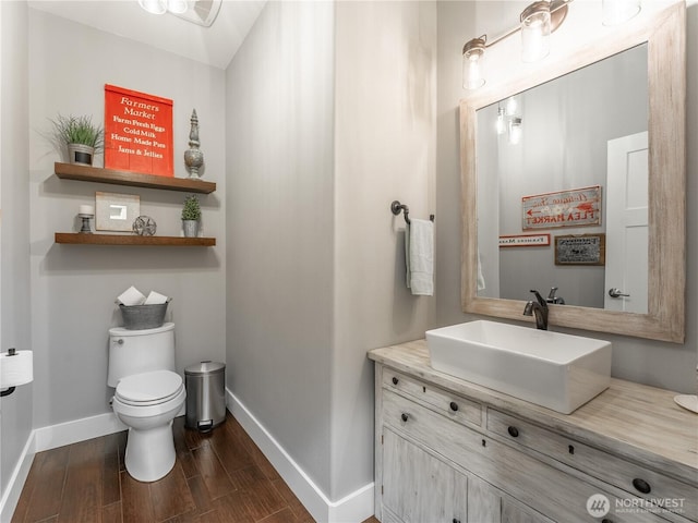 2038 Maiden Ln, Wenatchee, WA 98801 - half bath featuring vanity and wood finished floors