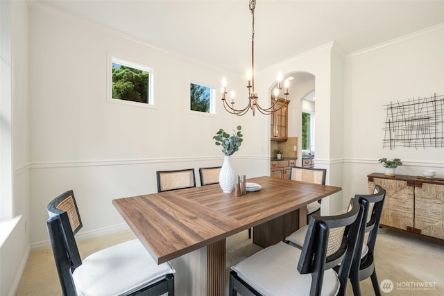 108 239th Way SE, Sammamish, WA 98074 - dining room with healthy amount of natural light, ornamental molding, a chandelier, and light colored carpet