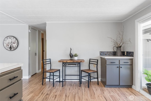 1841 Trosper Rd SW Unit 24, Tumwater, WA 98512 - dining area featuring light wood-style floors and ornamental molding