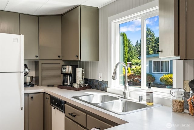 1841 Trosper Rd SW Unit 24, Tumwater, WA 98512 - kitchen featuring freestanding refrigerator, healthy amount of natural light, gray cabinetry, and light countertops