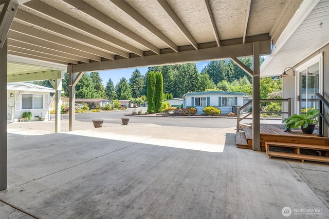 1841 Trosper Rd SW Unit 24, Tumwater, WA 98512 - view of patio / terrace featuring view of wooded area