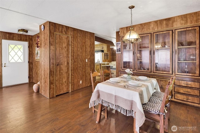 4015 Eliza Ave Unit 47, Bellingham, WA 98226 - dining area featuring wooden walls, dark wood-style flooring, and a chandelier