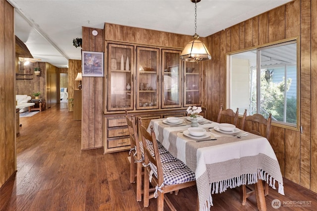 4015 Eliza Ave Unit 47, Bellingham, WA 98226 - dining space with wooden walls and dark wood finished floors
