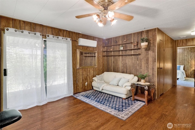 4015 Eliza Ave Unit 47, Bellingham, WA 98226 - living area with wooden walls, wood finished floors, ceiling fan, and an AC wall unit