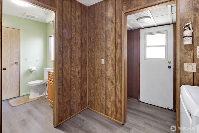 4015 Eliza Ave Unit 47, Bellingham, WA 98226 - bathroom with wood finished floors, vanity, and wooden walls