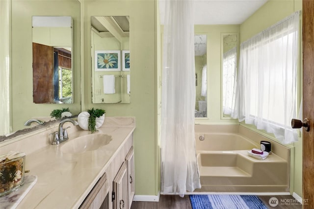 4015 Eliza Ave Unit 47, Bellingham, WA 98226 - full bathroom with plenty of natural light, a tub, and vanity