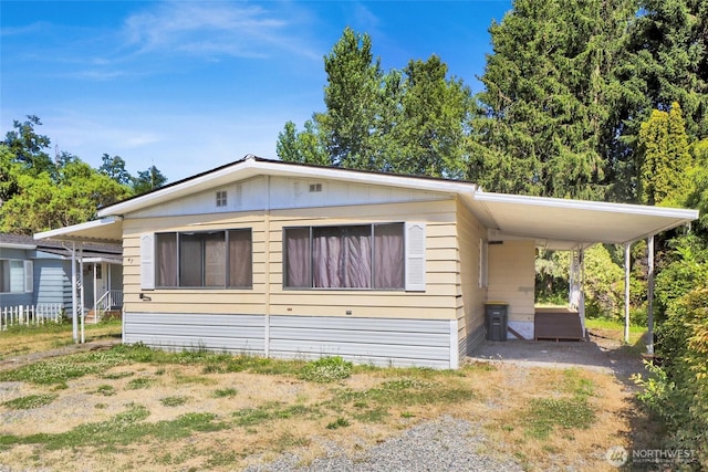 4015 Eliza Ave Unit 47, Bellingham, WA 98226 - manufactured / mobile home featuring an attached carport and driveway