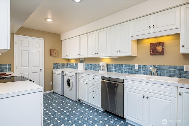 3719 NE 145th St, Seattle, WA 98155 - kitchen featuring dishwasher, independent washer and dryer, white cabinetry, light countertops, and recessed lighting
