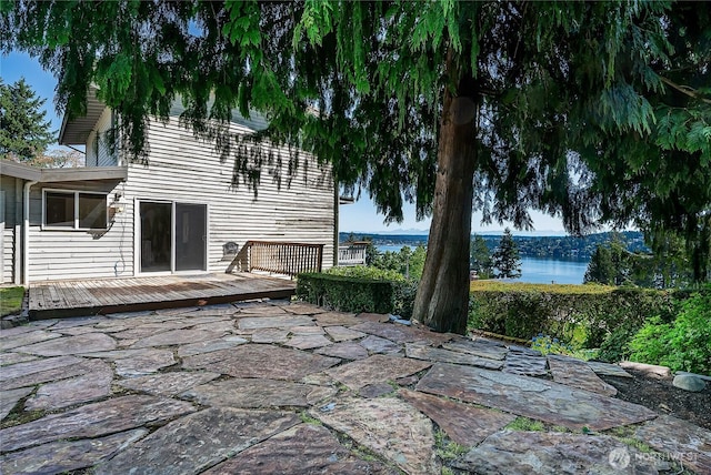 3719 NE 145th St, Seattle, WA 98155 - view of patio / terrace with a deck with water view