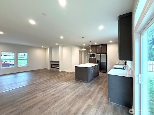 45332 Limestone St, Concrete, WA 98237 - kitchen with appliances with stainless steel finishes, healthy amount of natural light, light countertops, a center island, and recessed lighting
