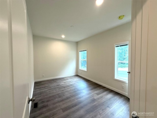 45332 Limestone St, Concrete, WA 98237 - empty room with dark wood finished floors, recessed lighting, and a smoke detector