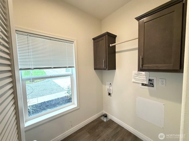45332 Limestone St, Concrete, WA 98237 - laundry area with electric dryer hookup, dark wood finished floors, hookup for a washing machine, and cabinet space