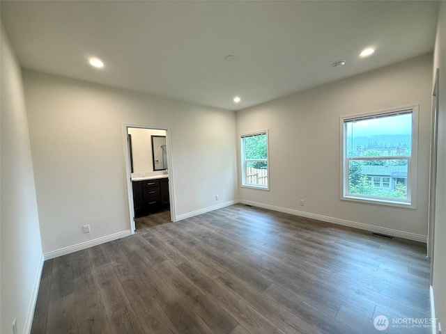 45332 Limestone St, Concrete, WA 98237 - spare room featuring dark wood-type flooring and recessed lighting