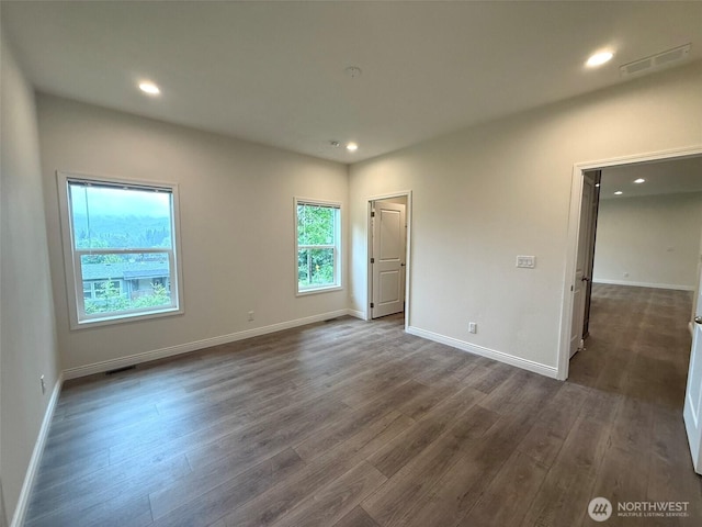 45332 Limestone St, Concrete, WA 98237 - unfurnished bedroom featuring dark wood-style floors and recessed lighting