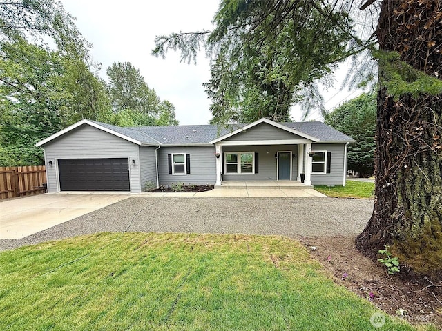 45332 Limestone St, Concrete, WA 98237 - ranch-style home with a garage, driveway, covered porch, and roof with shingles