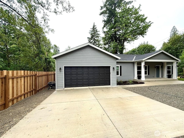 45332 Limestone St, Concrete, WA 98237 - ranch-style house with a garage, covered porch, and roof with shingles