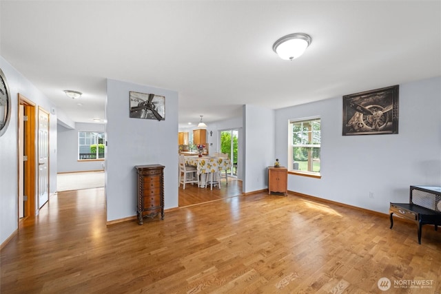 1877 Emerald Way, Lynden, WA 98264 - unfurnished living room featuring wood finished floors and baseboards
