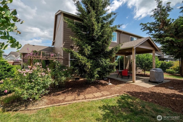 1877 Emerald Way, Lynden, WA 98264 - back of house featuring a patio and a gazebo