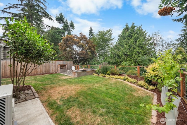 18328 15th Pl NE, Shoreline, WA 98155 - fenced backyard with a vegetable garden