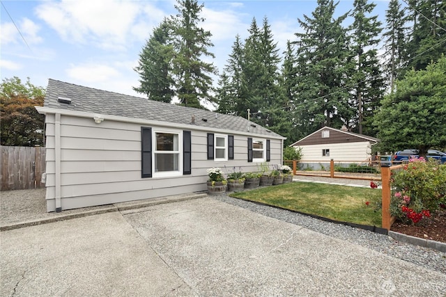 18328 15th Pl NE, Shoreline, WA 98155 - view of front facade with a patio area and roof with shingles
