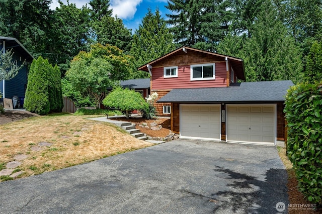10816 NE 154th Pl, Bothell, WA 98011 - tri-level home featuring driveway, roof with shingles, and an attached garage