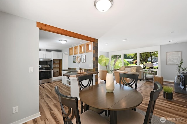 10816 NE 154th Pl, Bothell, WA 98011 - dining space with light wood finished floors and recessed lighting