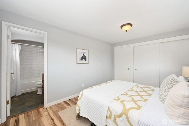 10816 NE 154th Pl, Bothell, WA 98011 - bedroom with a closet, light wood finished floors, and connected bathroom
