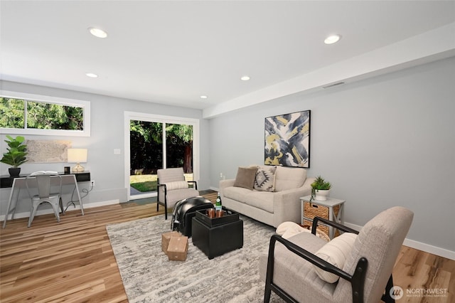 10816 NE 154th Pl, Bothell, WA 98011 - living area featuring light wood-style flooring, recessed lighting, and an office area