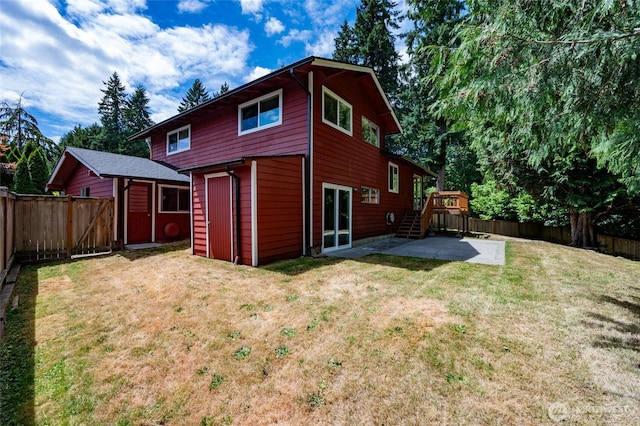 10816 NE 154th Pl, Bothell, WA 98011 - back of property featuring a patio, a fenced backyard, and a wooden deck