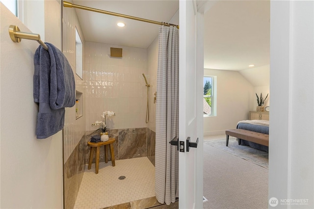 3430 42nd Ave SW, Seattle, WA 98116 - bathroom featuring a tile shower, recessed lighting, and lofted ceiling