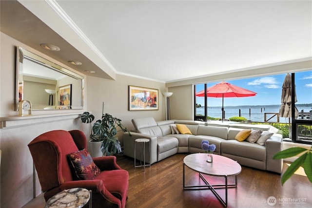 9717 NE Juanita Dr Unit 101, Kirkland, WA 98034 - living room with wood finished floors, crown molding, and a water view