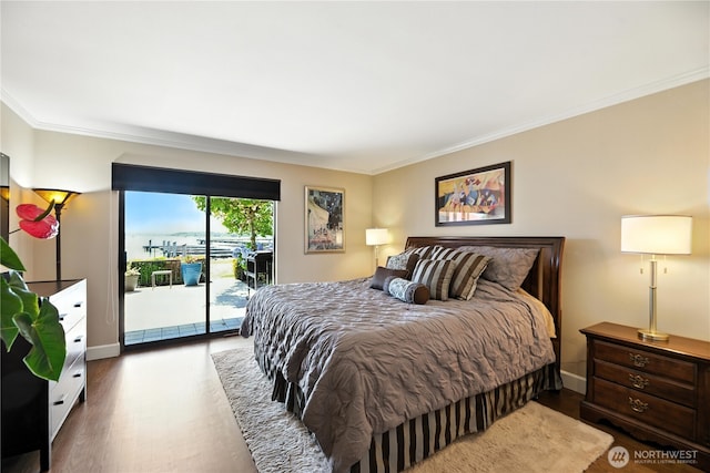 9717 NE Juanita Dr Unit 101, Kirkland, WA 98034 - bedroom with access to exterior, ornamental molding, and wood finished floors