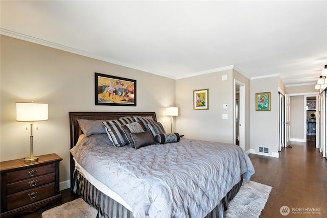 9717 NE Juanita Dr Unit 101, Kirkland, WA 98034 - bedroom featuring dark wood finished floors and crown molding