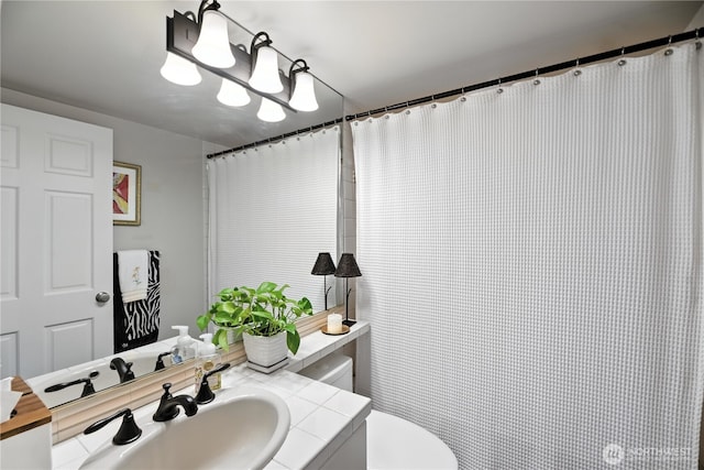 9717 NE Juanita Dr Unit 101, Kirkland, WA 98034 - bathroom with vanity and toilet