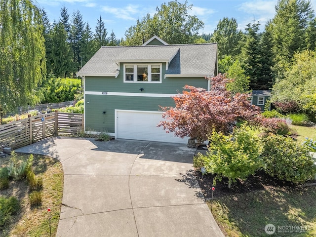 3319 Sunny Cove Ct, Bellingham, WA 98226 - view of front of home with an attached garage, driveway, and roof with shingles