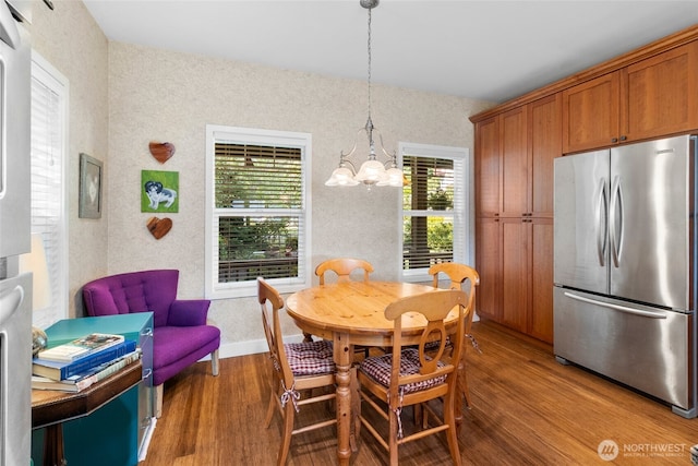 3319 Sunny Cove Ct, Bellingham, WA 98226 - dining room featuring wood finished floors and a chandelier