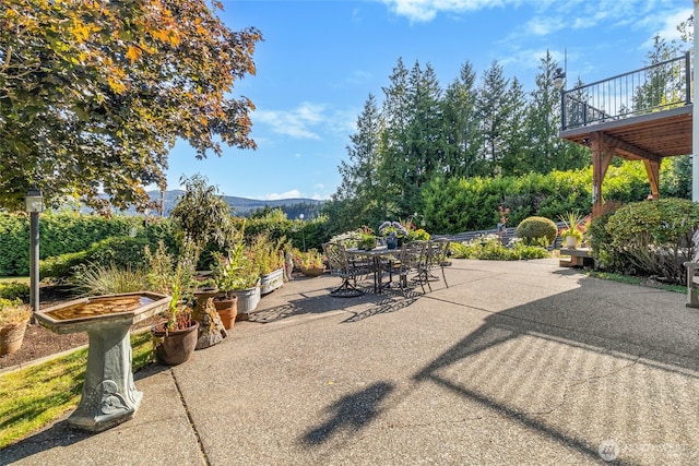 3319 Sunny Cove Ct, Bellingham, WA 98226 - view of patio with outdoor dining space and a mountain view