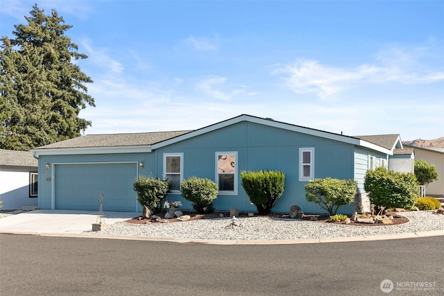 1809 Heritage Hvn, Wenatchee, WA 98801 - single story home with an attached garage, concrete driveway, and roof with shingles
