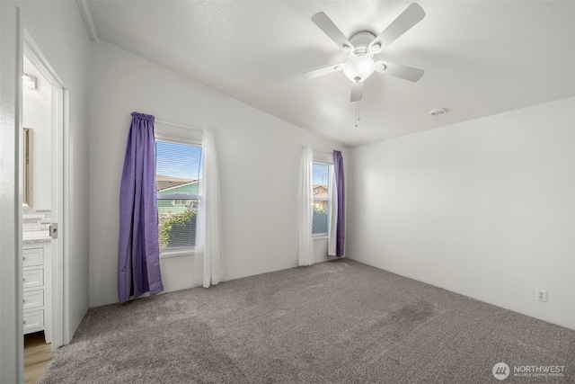 1809 Heritage Hvn, Wenatchee, WA 98801 - carpeted spare room featuring healthy amount of natural light, ceiling fan, and vaulted ceiling