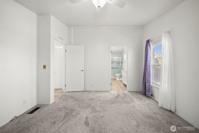 1809 Heritage Hvn, Wenatchee, WA 98801 - unfurnished bedroom featuring carpet floors, ensuite bath, and a ceiling fan