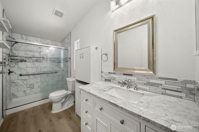1809 Heritage Hvn, Wenatchee, WA 98801 - bathroom with wood finished floors, vanity, and a shower stall