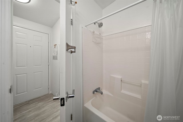 1809 Heritage Hvn, Wenatchee, WA 98801 - bathroom featuring shower / bath combo with shower curtain and wood finished floors