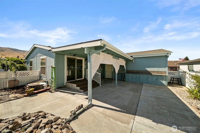 1809 Heritage Hvn, Wenatchee, WA 98801 - rear view of house with a patio and a mountain view