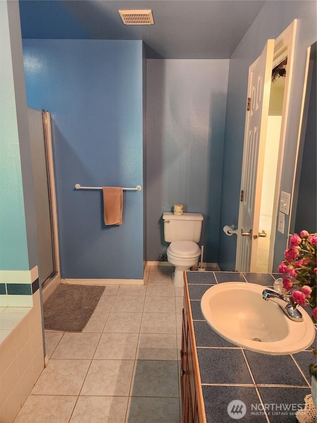 22528 100th Ave SE, Kent, WA 98031 - bathroom with vanity and tile patterned flooring