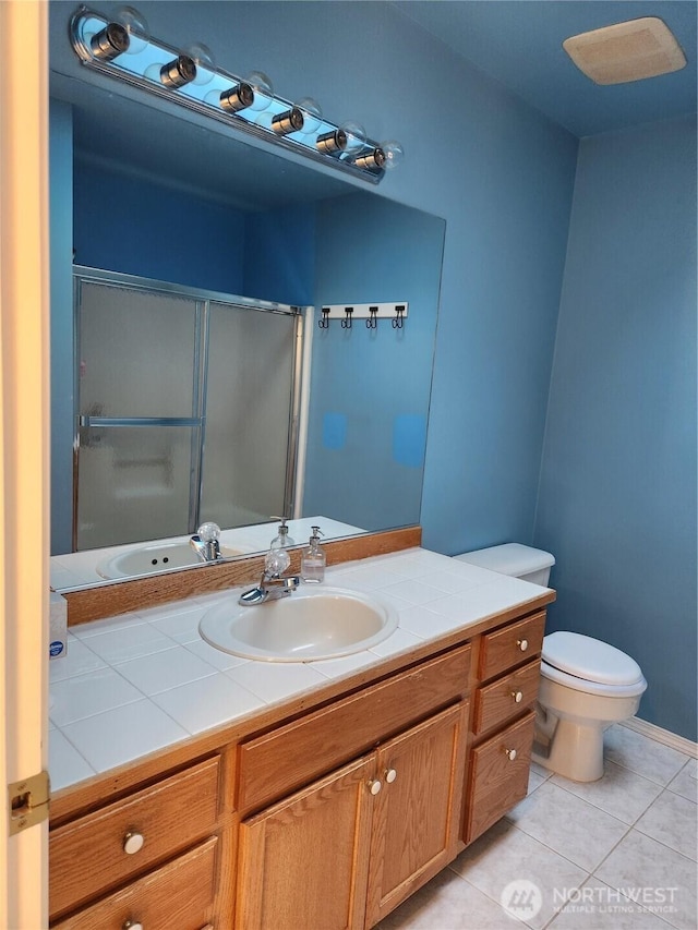 22528 100th Ave SE, Kent, WA 98031 - full bath with vanity, tile patterned floors, and an enclosed shower