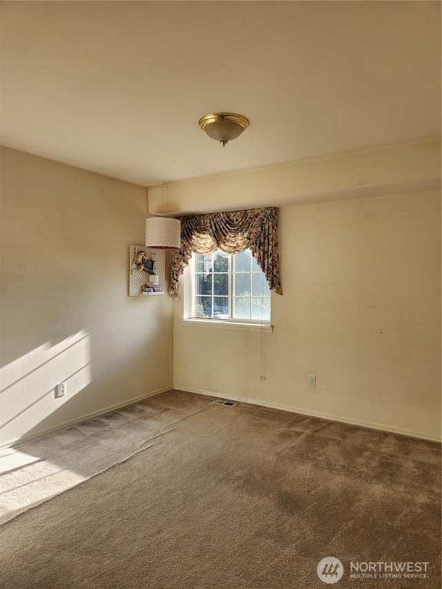 22528 100th Ave SE, Kent, WA 98031 - carpeted empty room featuring baseboards