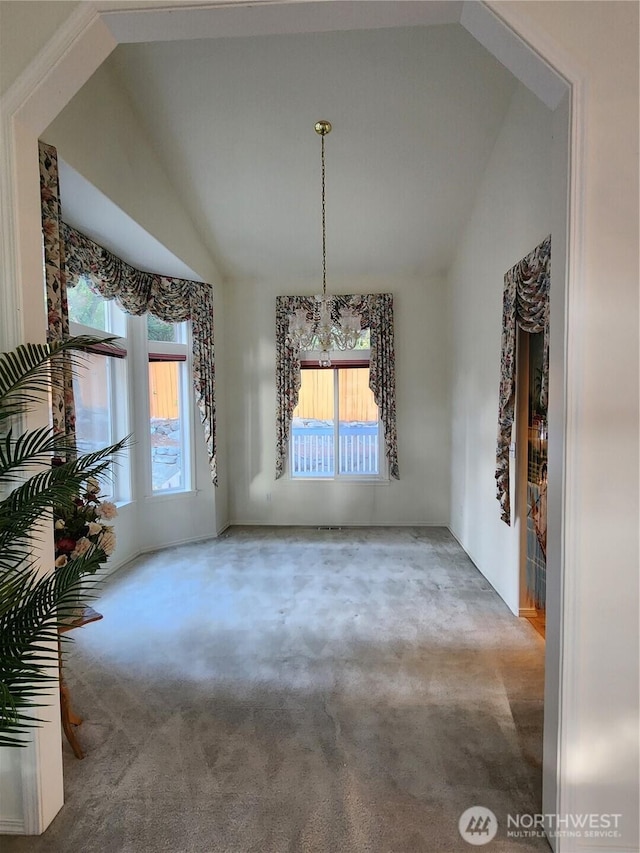 22528 100th Ave SE, Kent, WA 98031 - unfurnished dining area featuring lofted ceiling and carpet