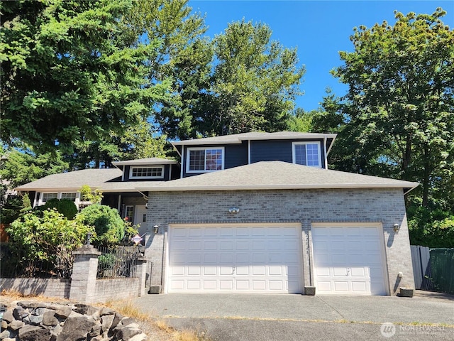 22528 100th Ave SE, Kent, WA 98031 - view of front of house with an attached garage, brick siding, driveway, and roof with shingles
